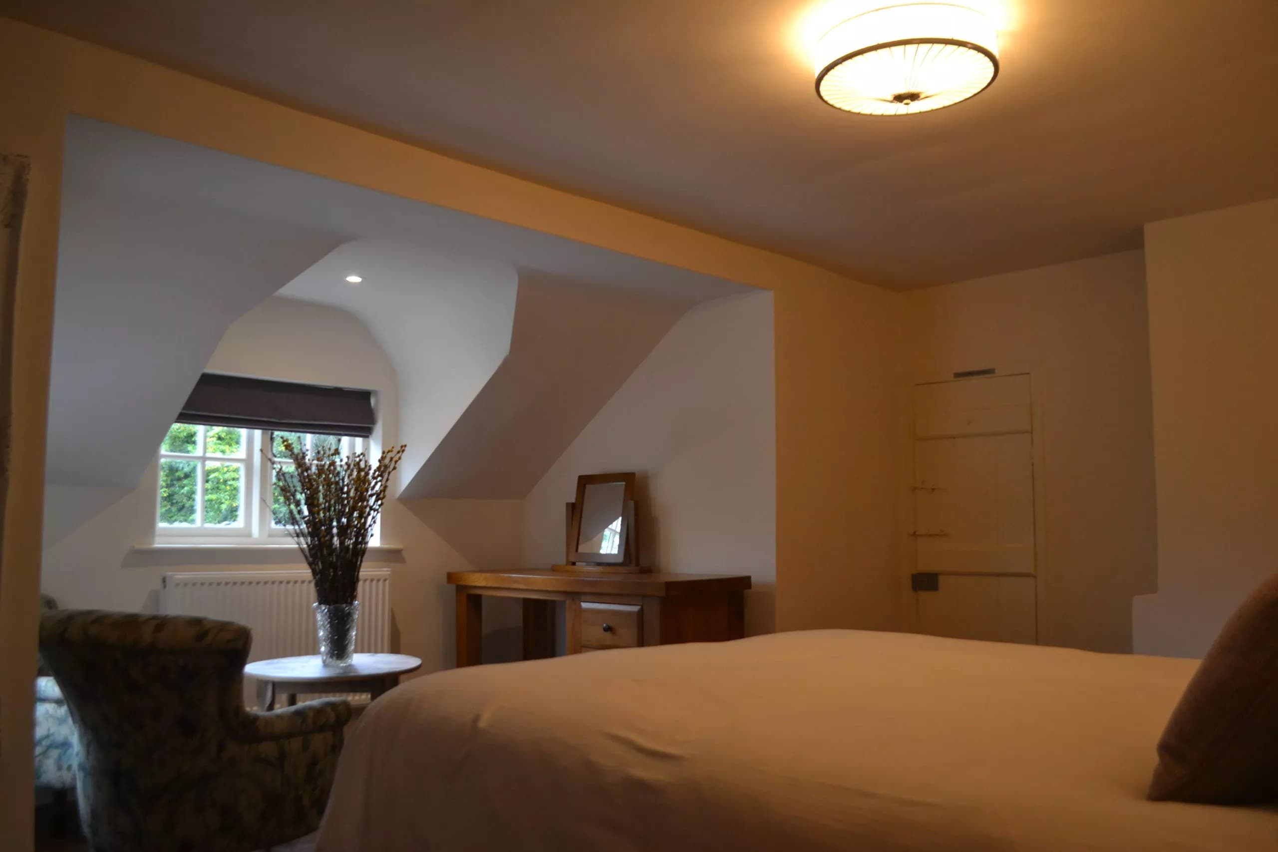 Atmospheric room with dormer window and dressing table