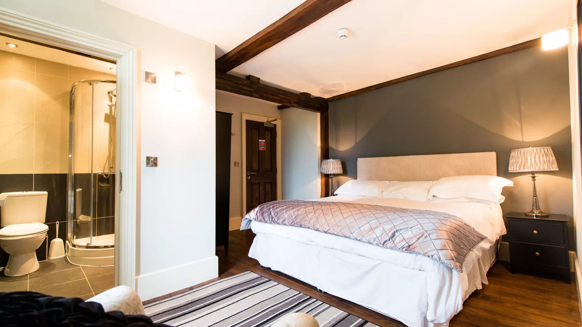 Elegant ensuite bedroom with Laura Ashley furnishings